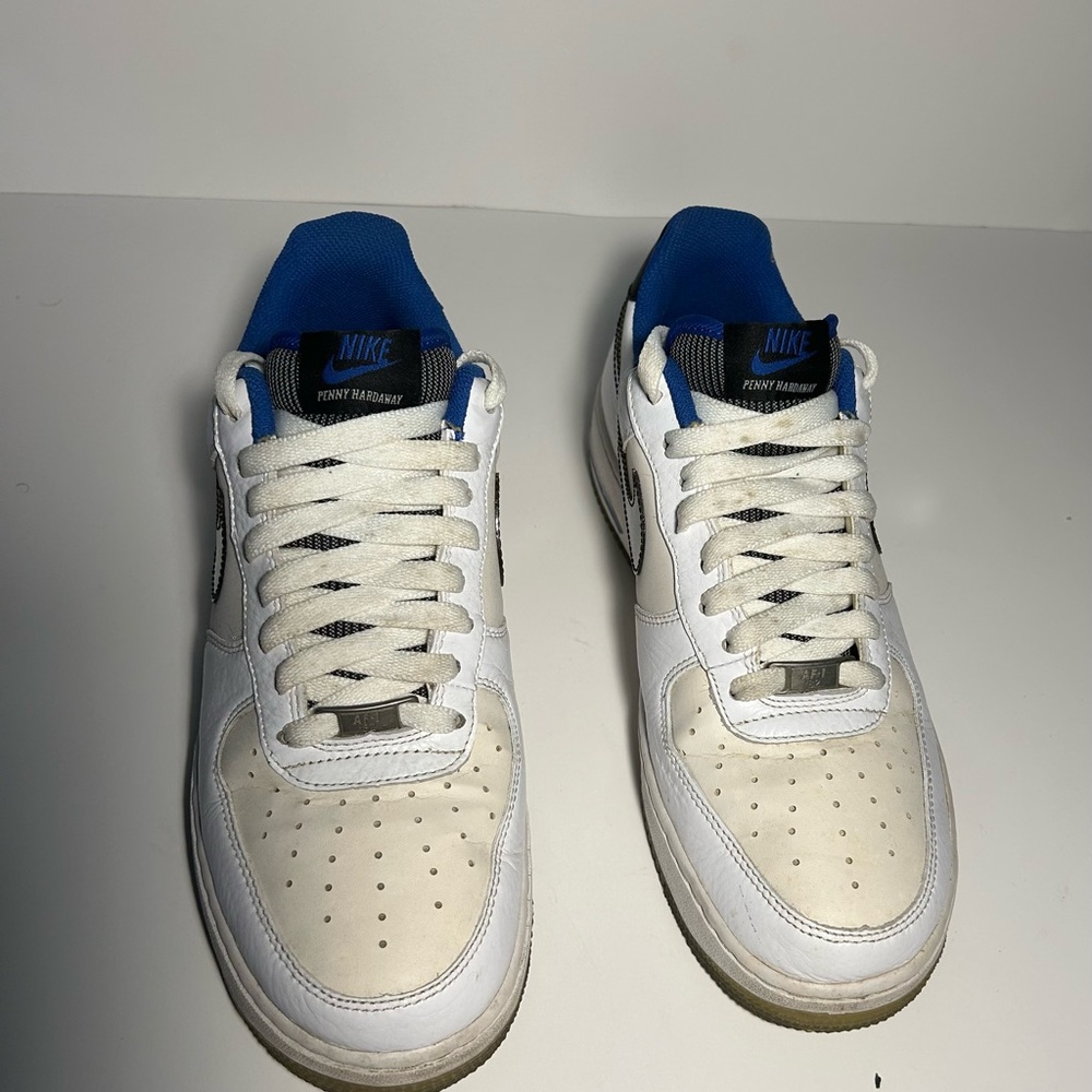 A pair of white and blue Penny Hardaway air forces